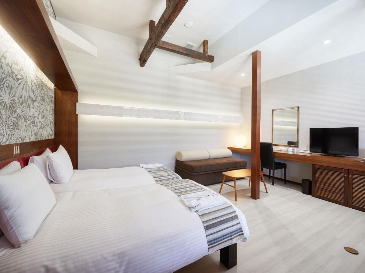 אונה La Casa Panacea Okinawa Resort מראה חיצוני תמונה